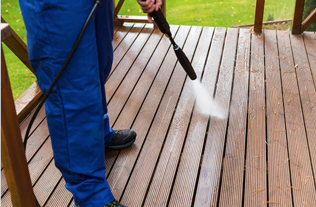 pressure cleaning a wood deck